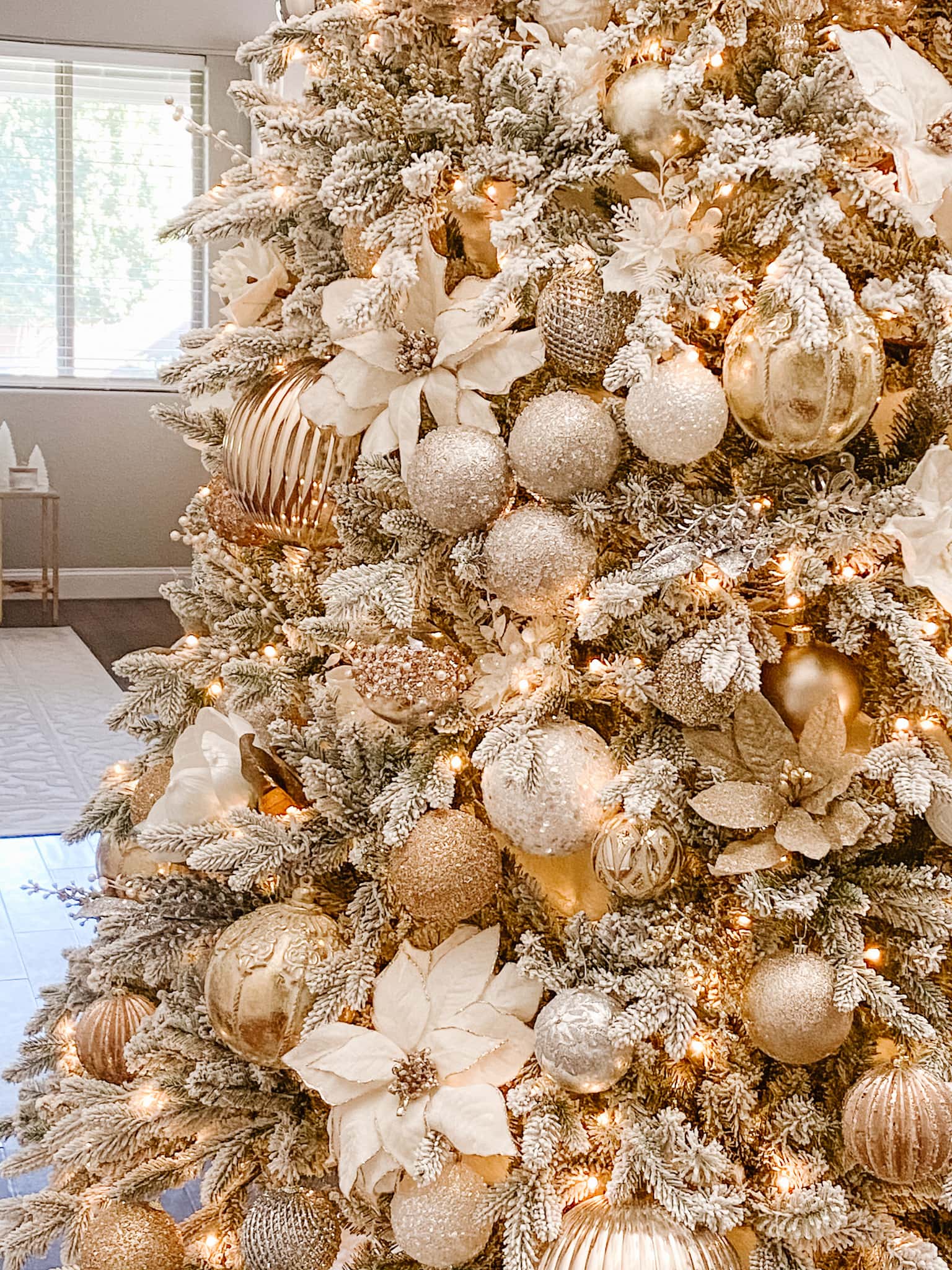 white and gold 12 foot Christmas tree ornament close up