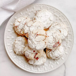 My main photo of the gluten-free amaretti cookies, stack on a white decorative plate.