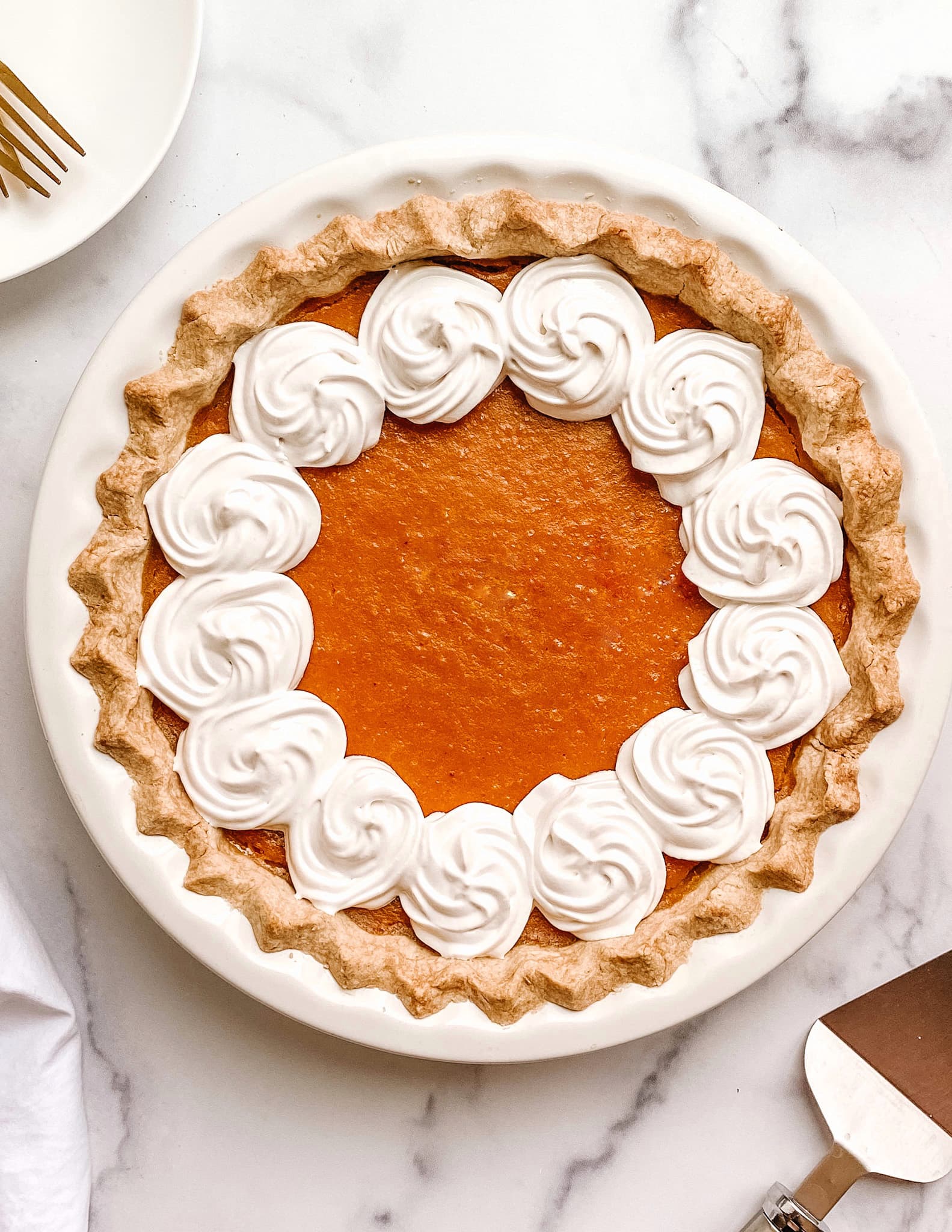 sweet potato pie with swirly meringue pipped topping