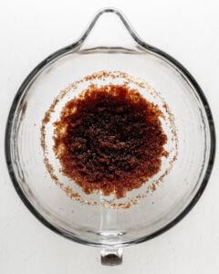 Softened coconut oil and sugars.