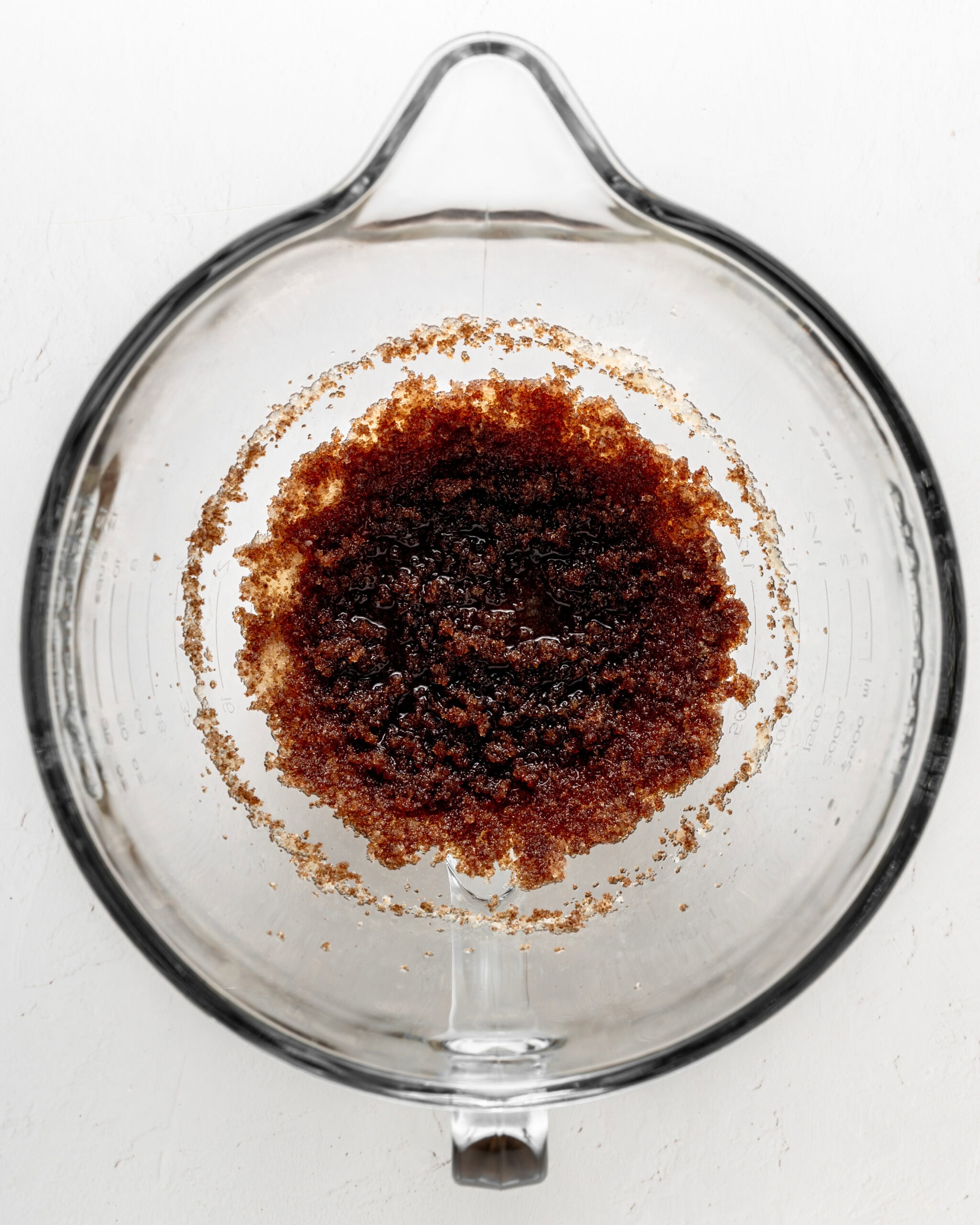 Softened coconut oil and sugars.