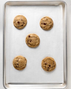 Coconut oil chocolate chip cookies baked on a baking tray.