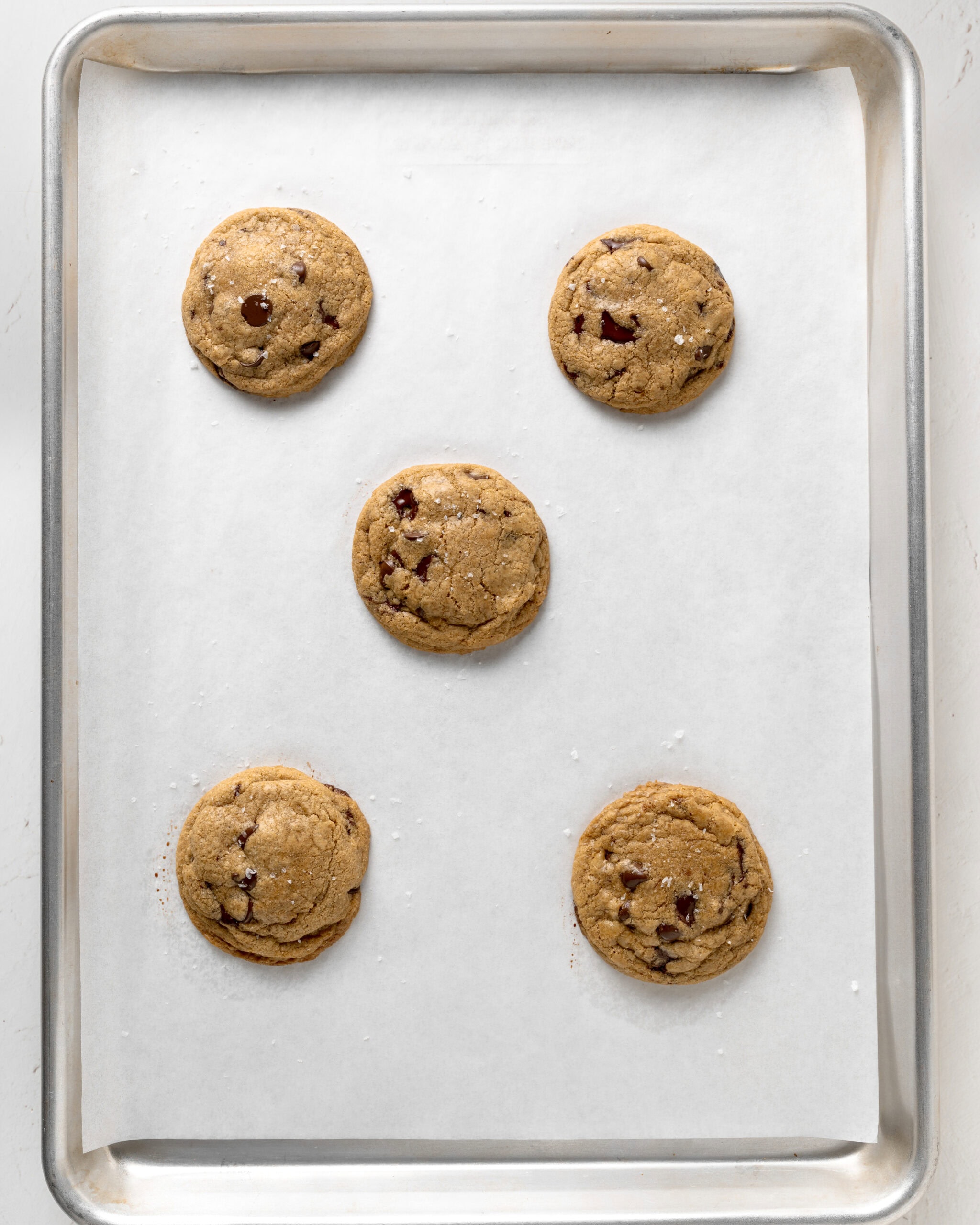 Coconut oil chocolate chip cookies baked on a baking tray.