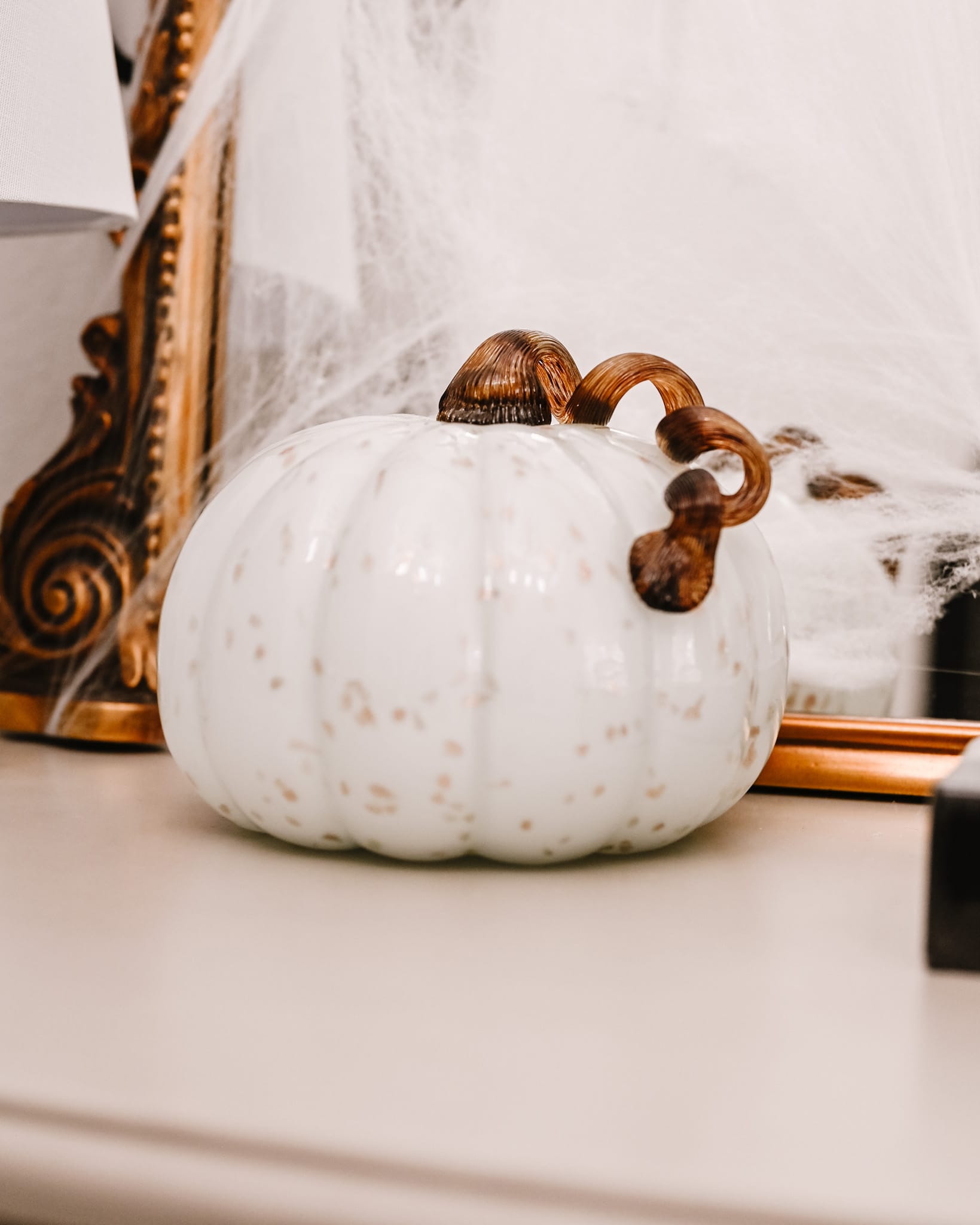 white glass pumpkin, halloween home tour decoration