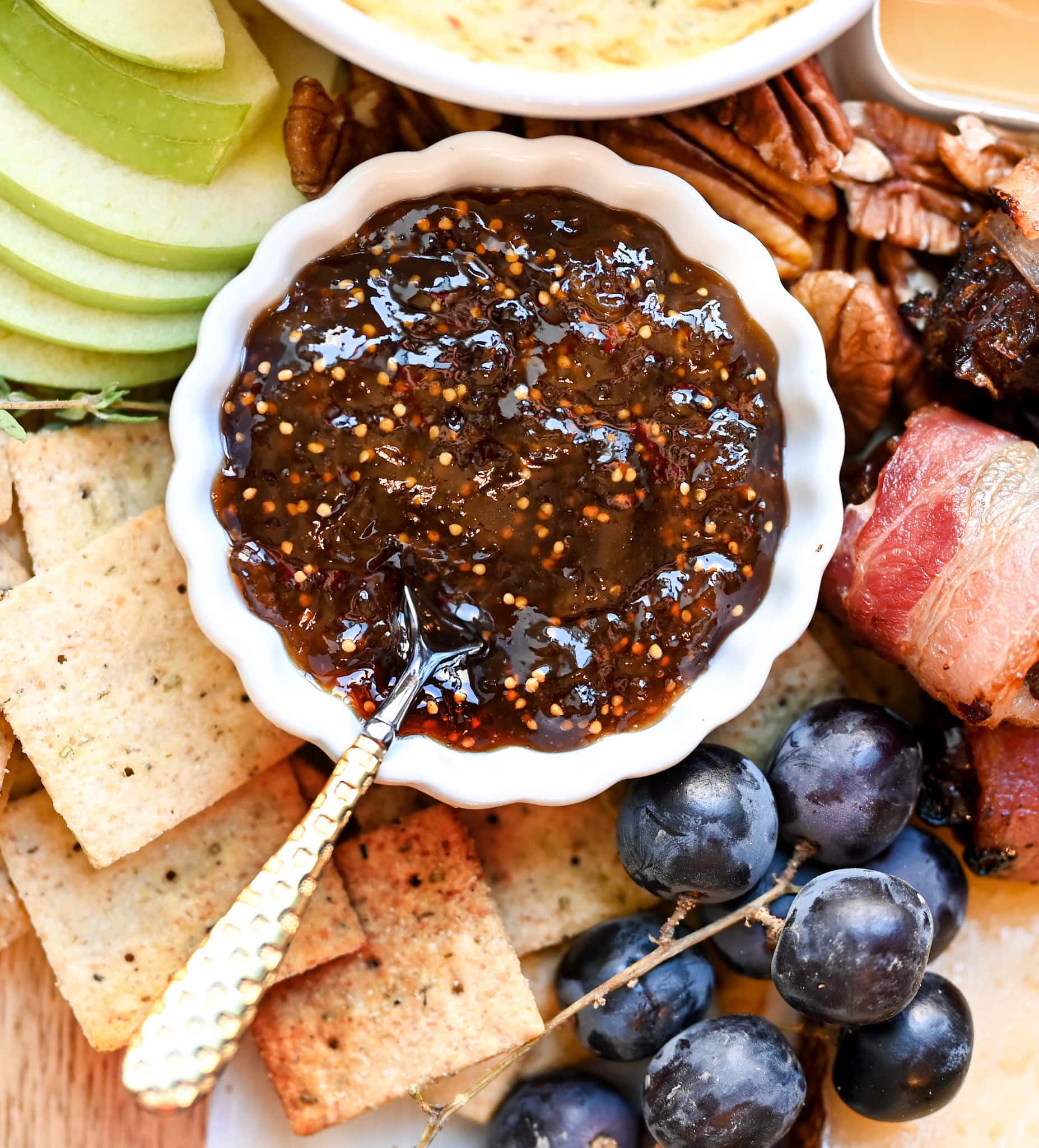 close up of fig jam in a white dipping bowl.