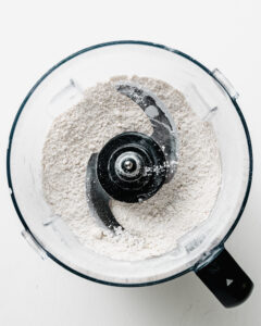 cutting butter into flour with a food processor.
