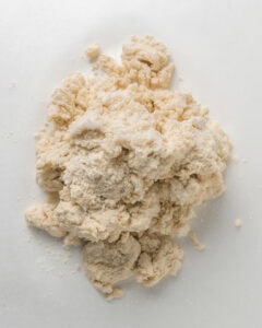 Work the gluten free biscuit dough.