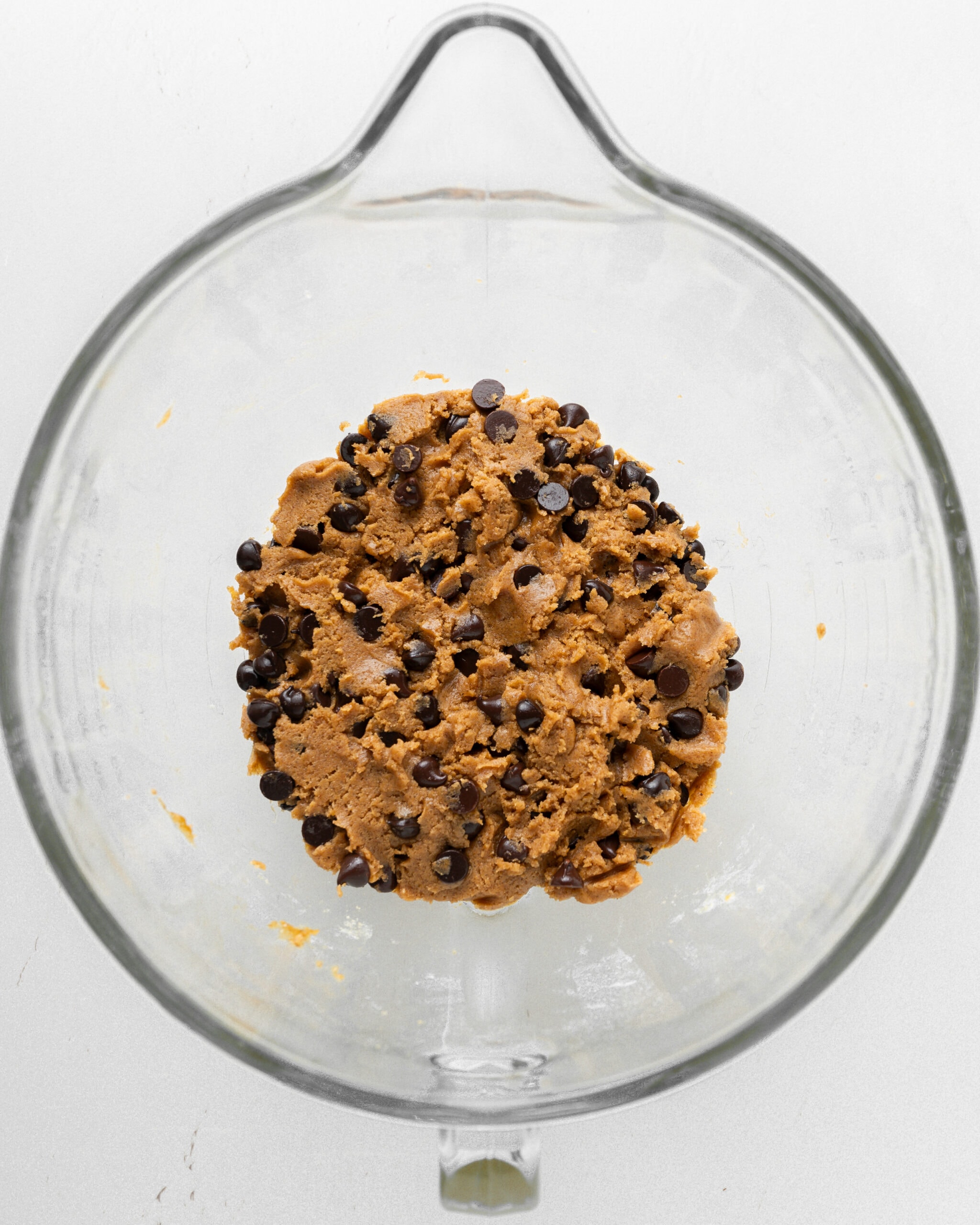 Pumpkin chocolate chip cookie dry ingredients with chocolate chips.