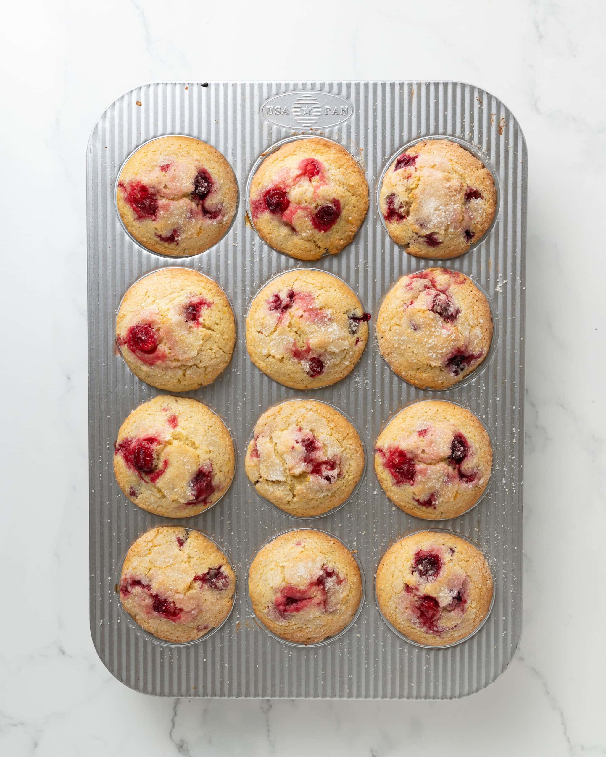 Baked gluten free cranberry orange muffins.