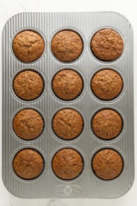 Baked carrot cake cupcakes.