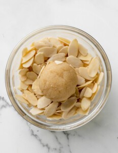 Roll Amaretti Cookie Dough in Almonds