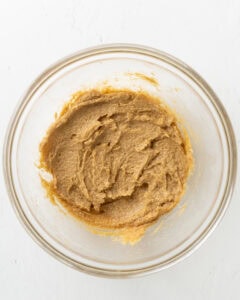 Creaming butter, sugar, and egg together.