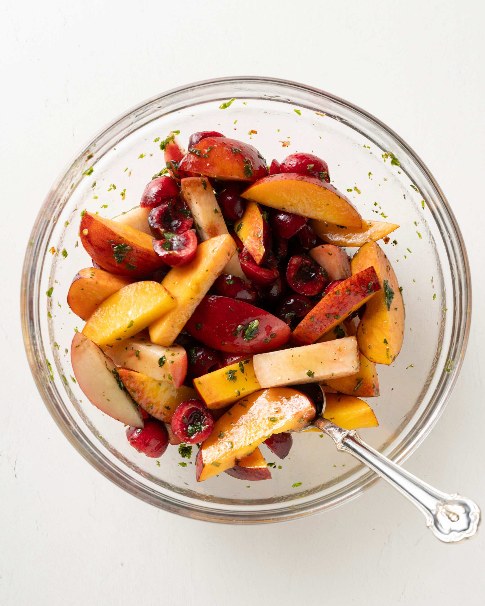 Burrata and peaches mixed with vinaigrette.