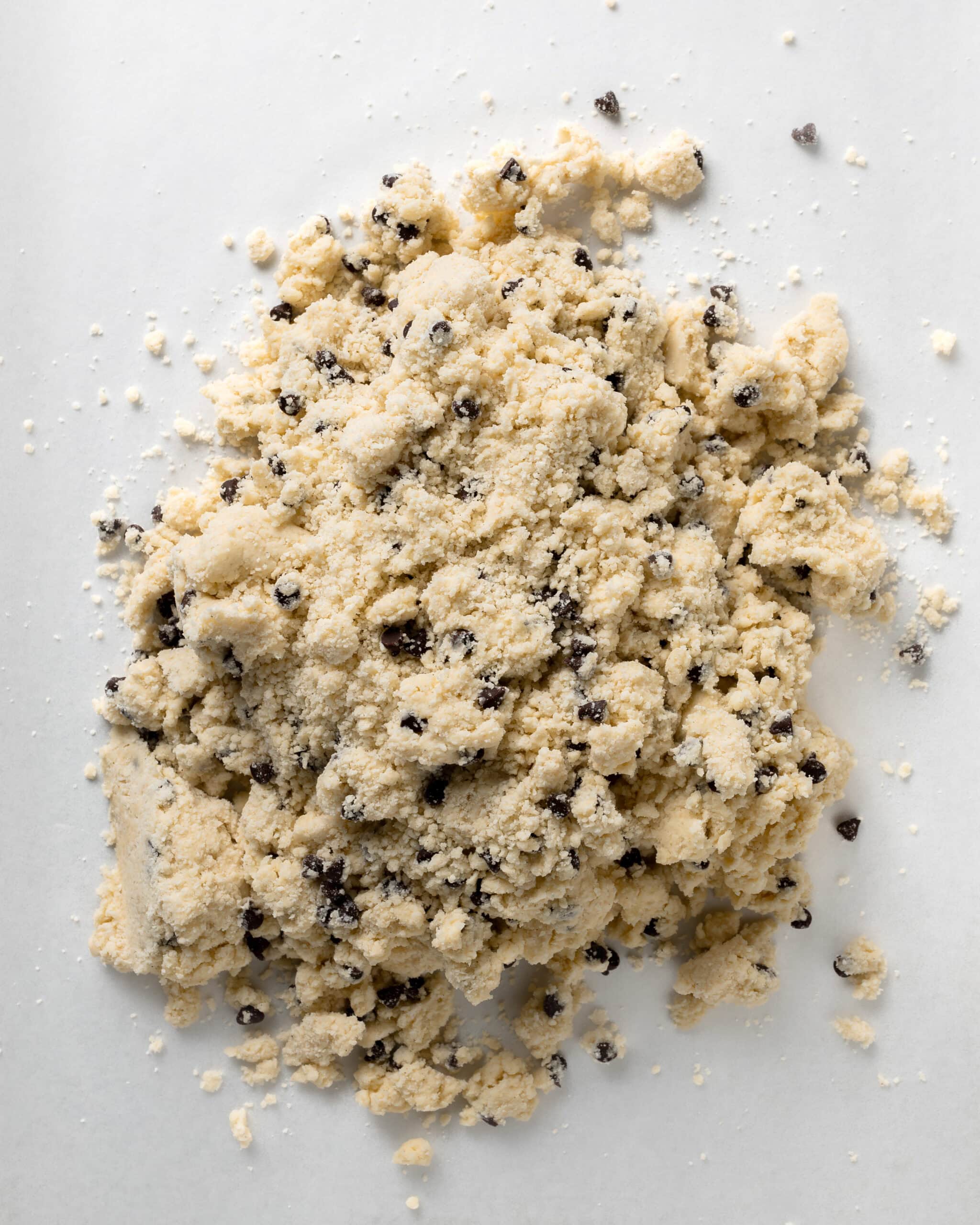 Chocolate chip scone dough rolled out.