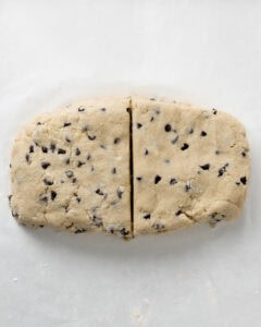 Chocolate Chip Scone Dough Cut In Half.