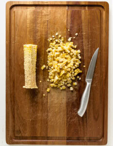 cutting the corn off the cobb