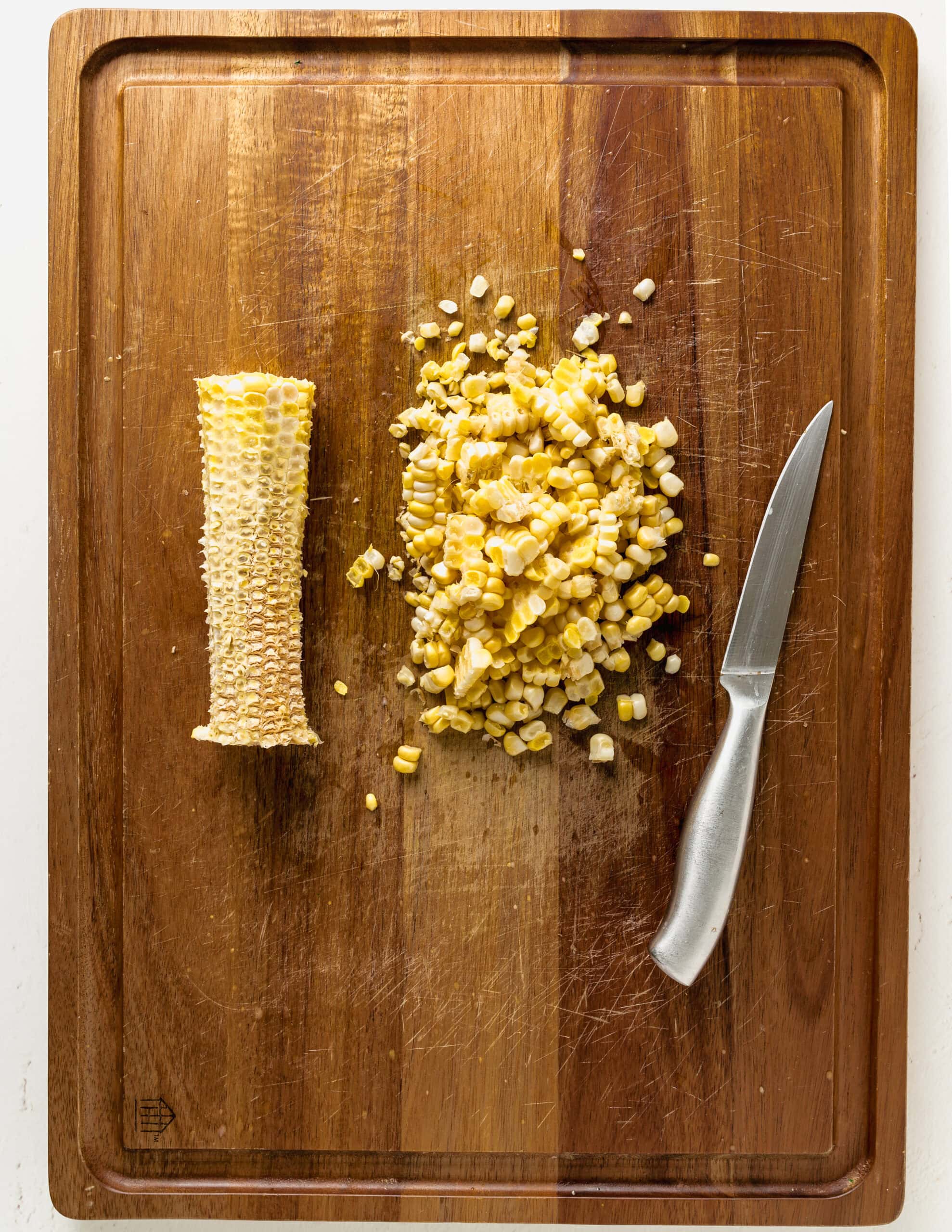 cutting the corn off the cobb