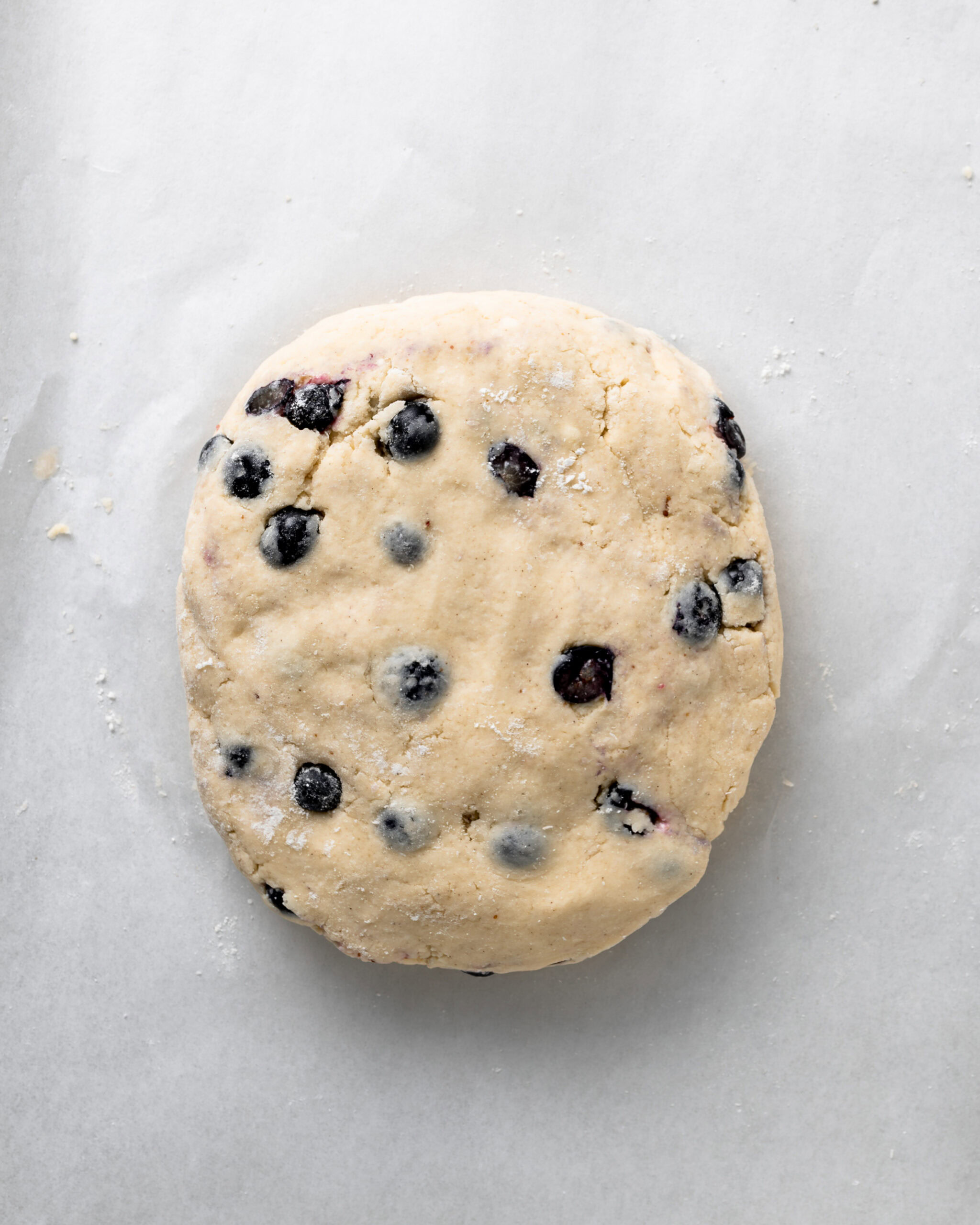 Shaping the blueberry scones into a circle.