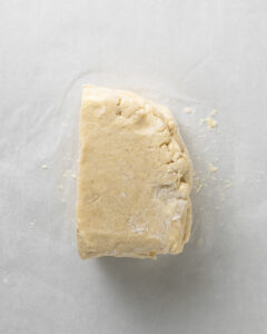 Stack the scone dough on top to create flaky layers.