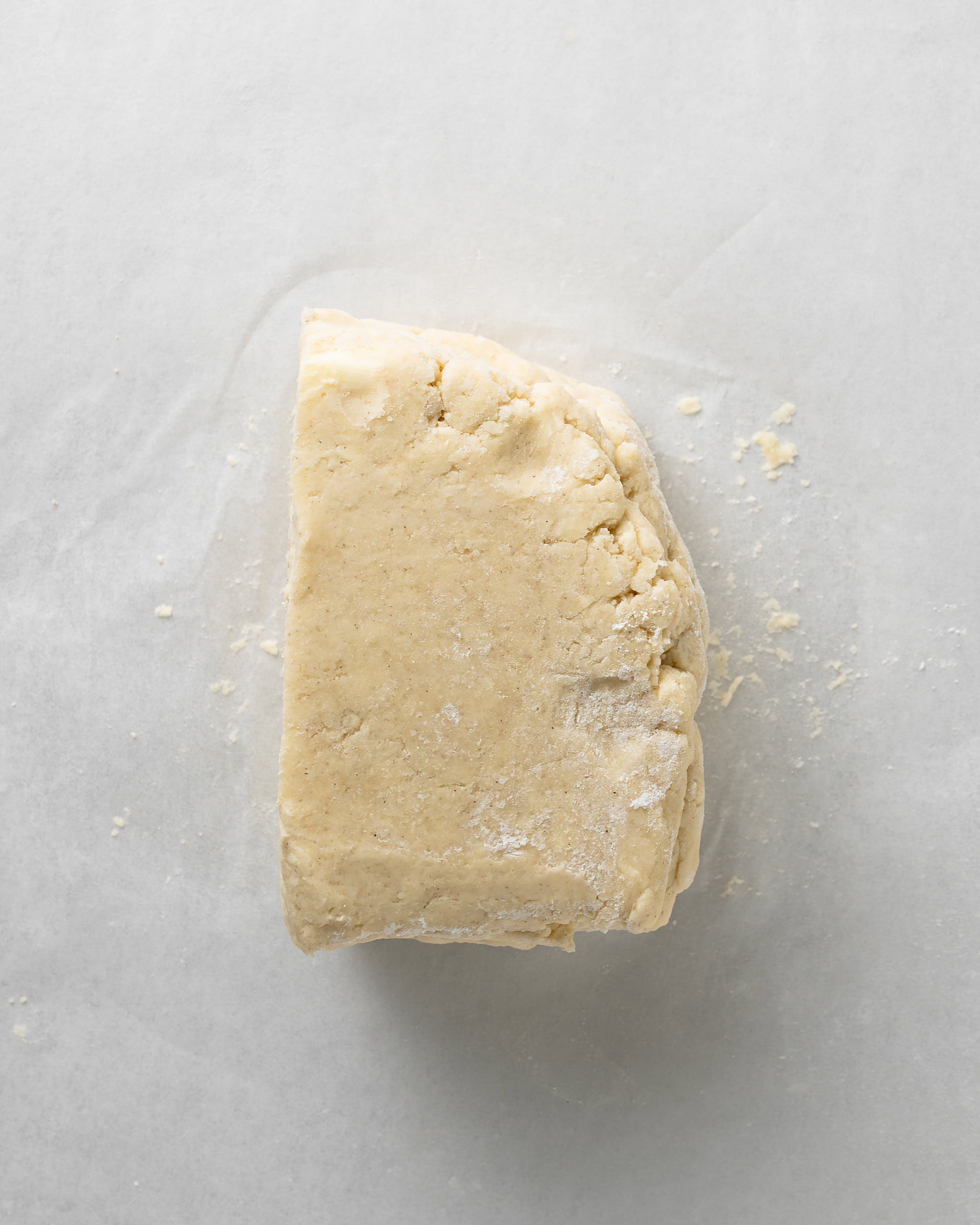 Stack the scone dough on top to create flaky layers.