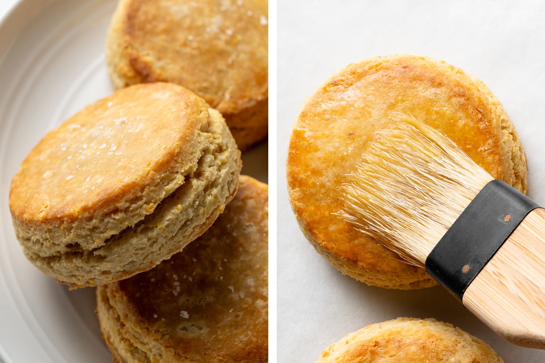Cornmeal biscuits with butter being brushed on top.