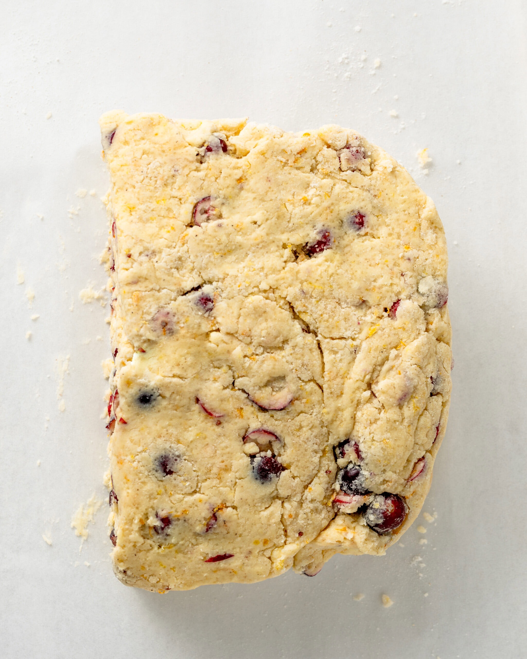 Cranberry orange scone stacked for lamination.