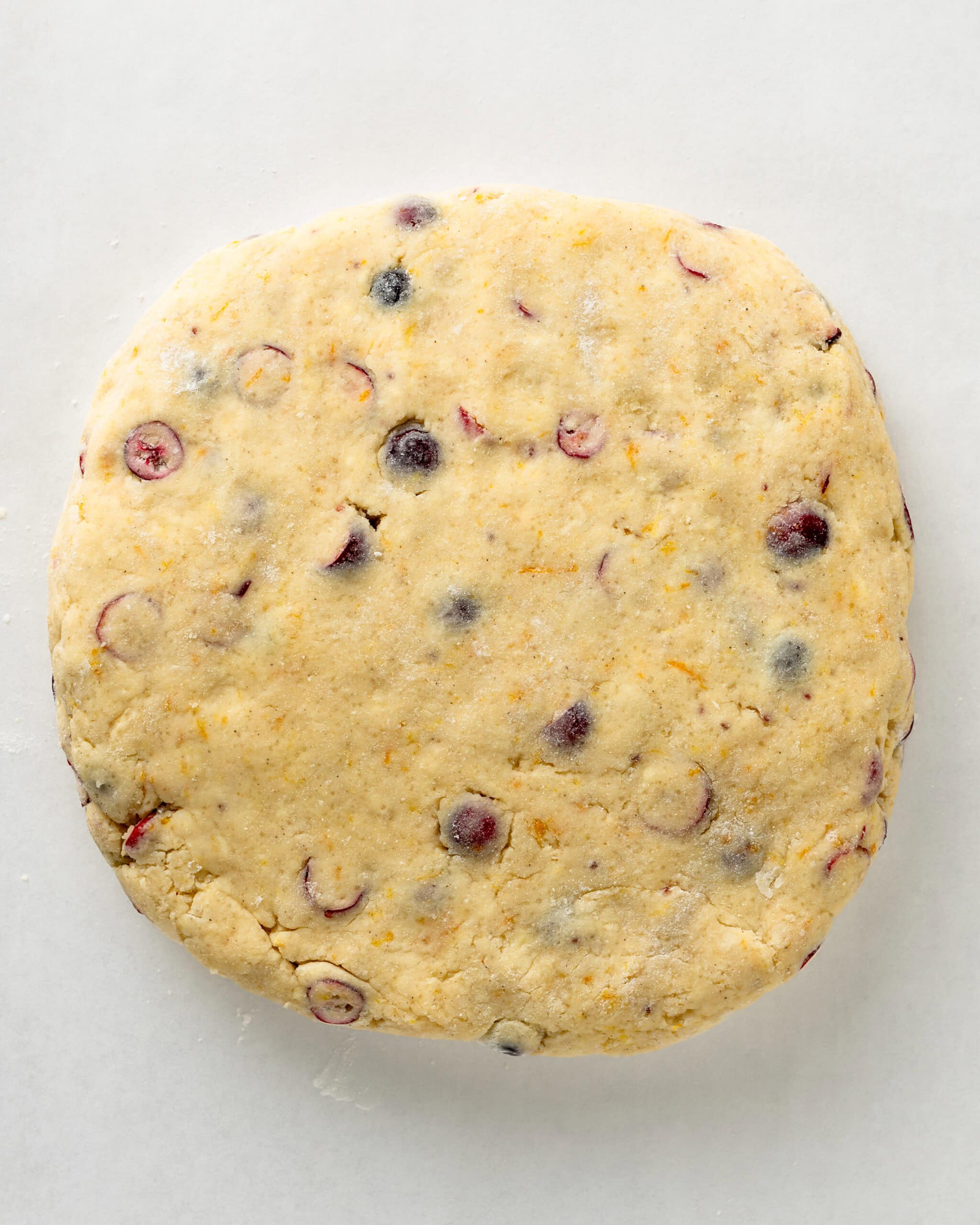 Cranberry Orange Scone Dough Shaped into a Round Disk.