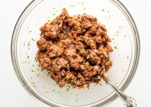 Jalapeno turkey burger mixture in a large glass bowl.