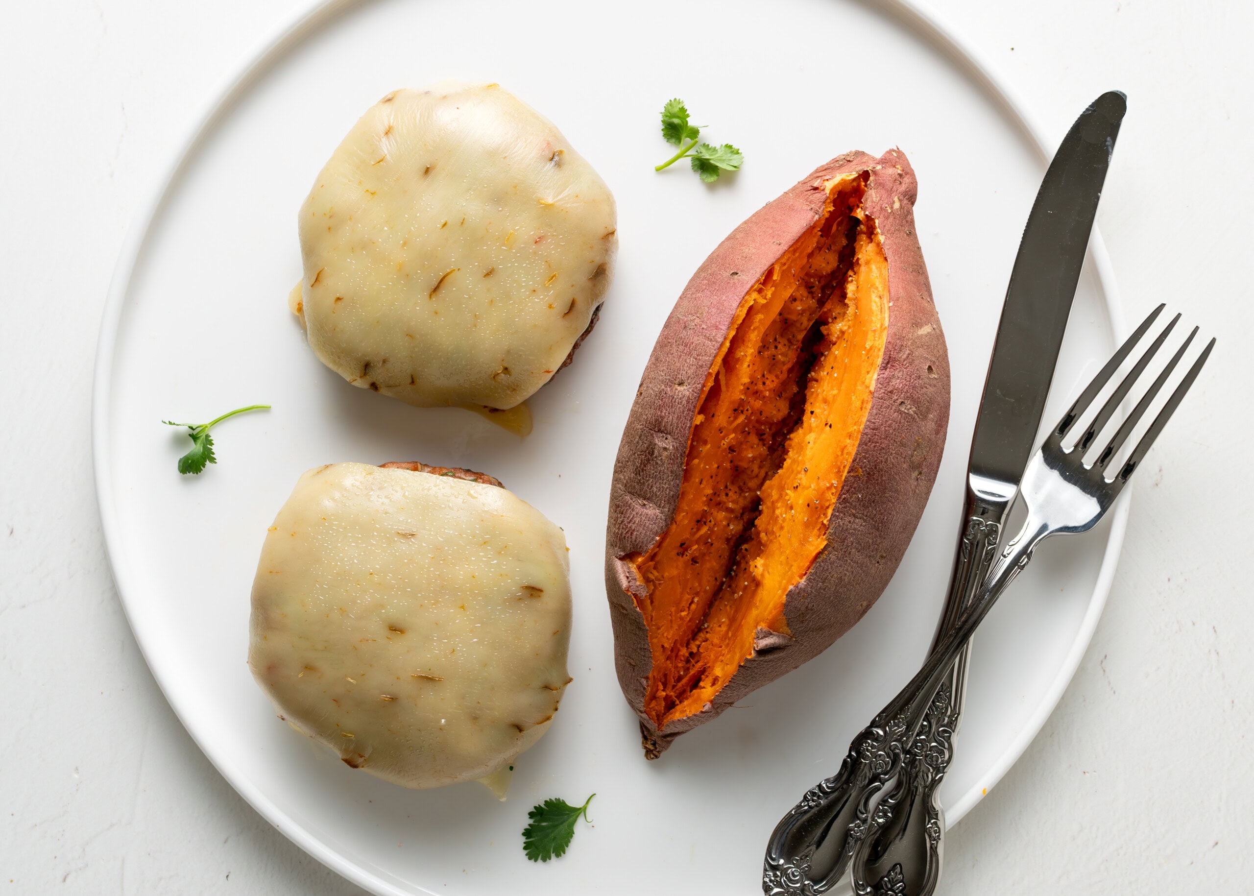 Jalapeno turkey burgers with cheese and sweet potato.