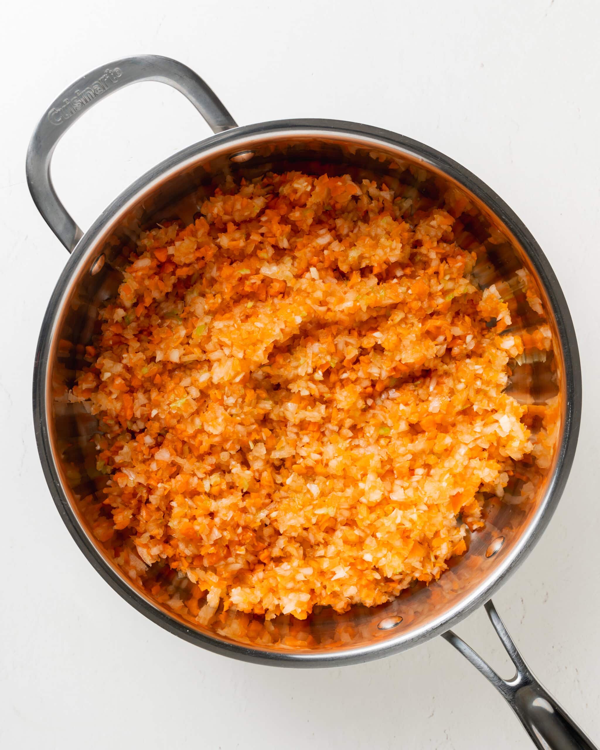 Saute vegetables in a skillet.