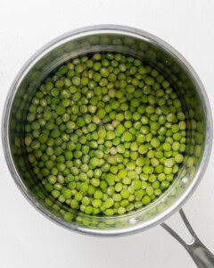 Marrowfat peas in a small saucepan with boiling water.